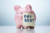 Piggy bank with a "Pay Rent" sticky note on it